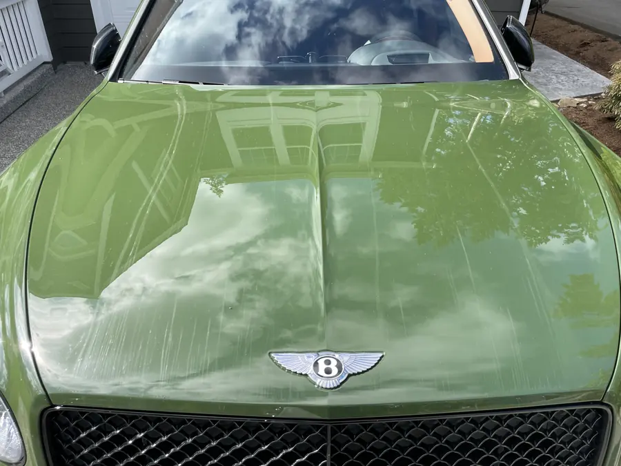 Bentley hood and badge with a fresh shine