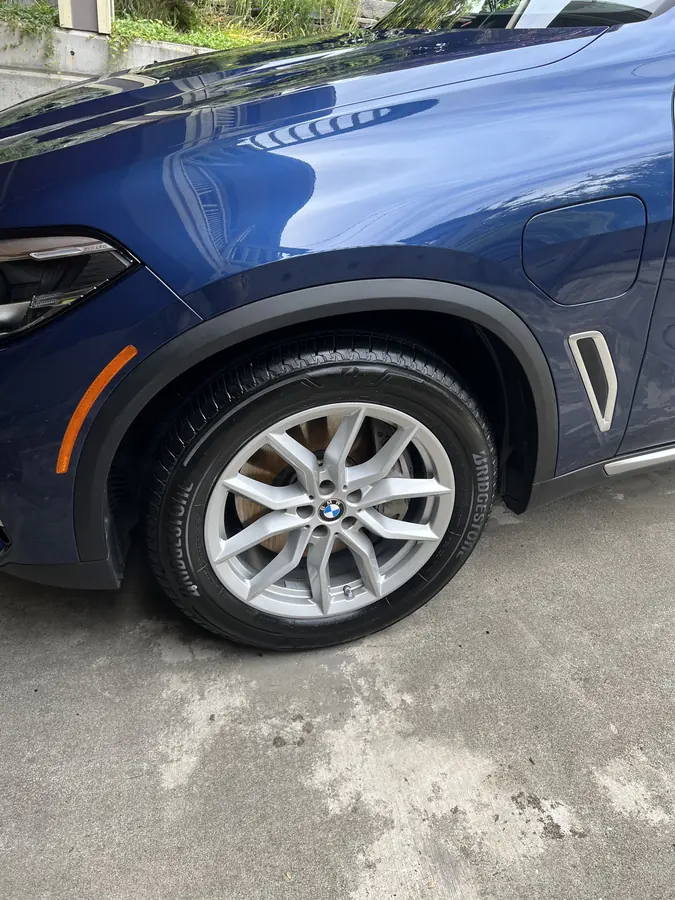 BMW wheel and fender cleaned